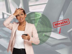 woman tracking missing laptop on her phone