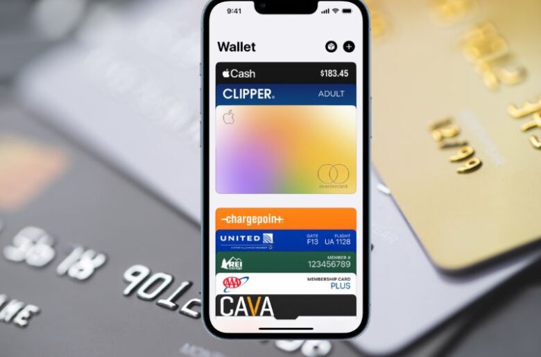 Credit cards in the background with iPhone Wallet app open
