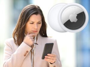 Concerned woman looking at phone and Apple AirTag logo