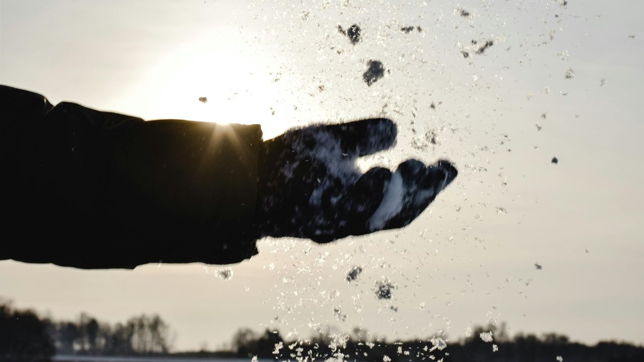 Image of a person wearing gloves