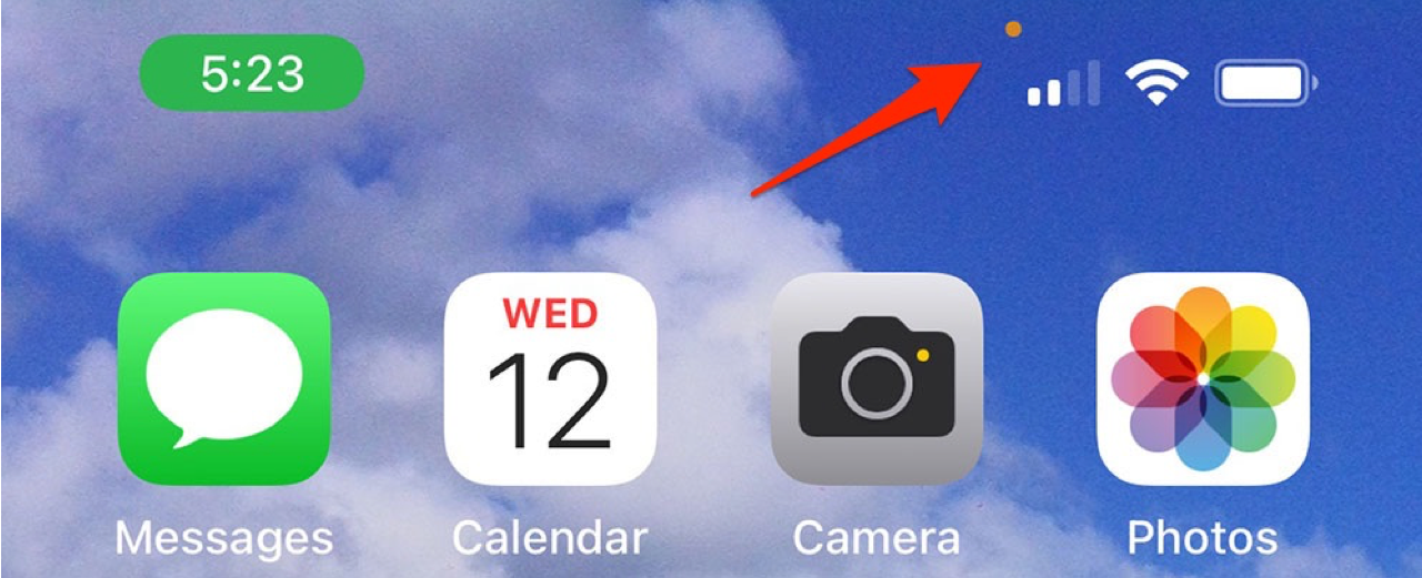 orange dot at top of iphone