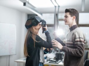 Man and woman with virtual reality headset