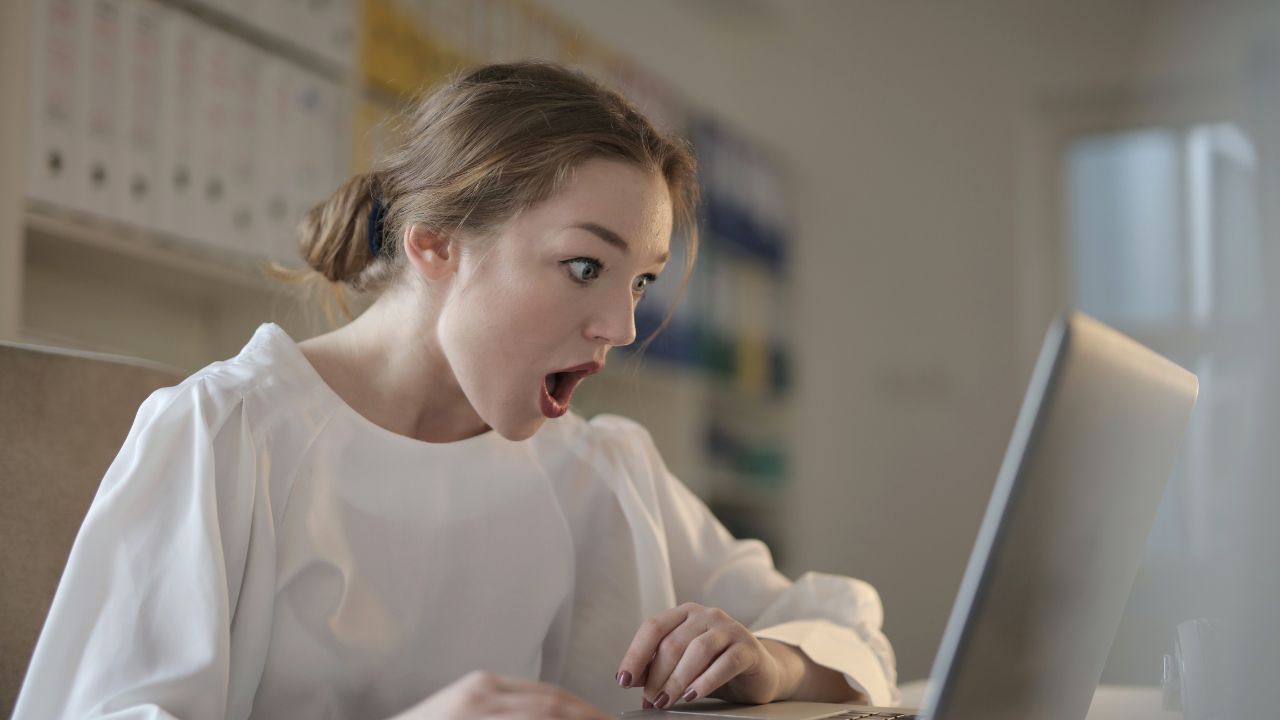 3-SHOCKED WOMAN ON COMPUTER