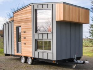 Tiny house with bedroom downstairs and living room upstairs