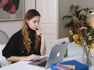 Woman working on a Mac