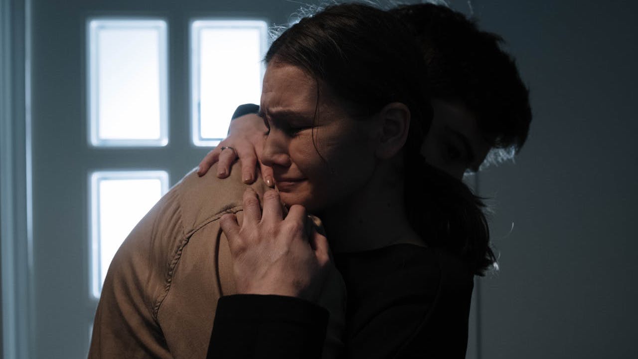 crying woman hugging