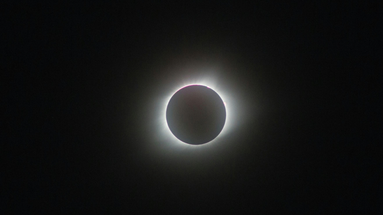 A stock photo of a solar eclipse viewed through a camera.