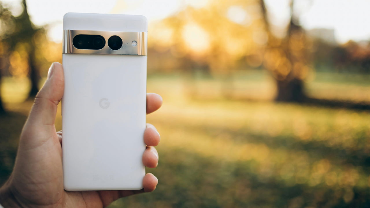 A Google Pixel 7 smartphone against a natural background