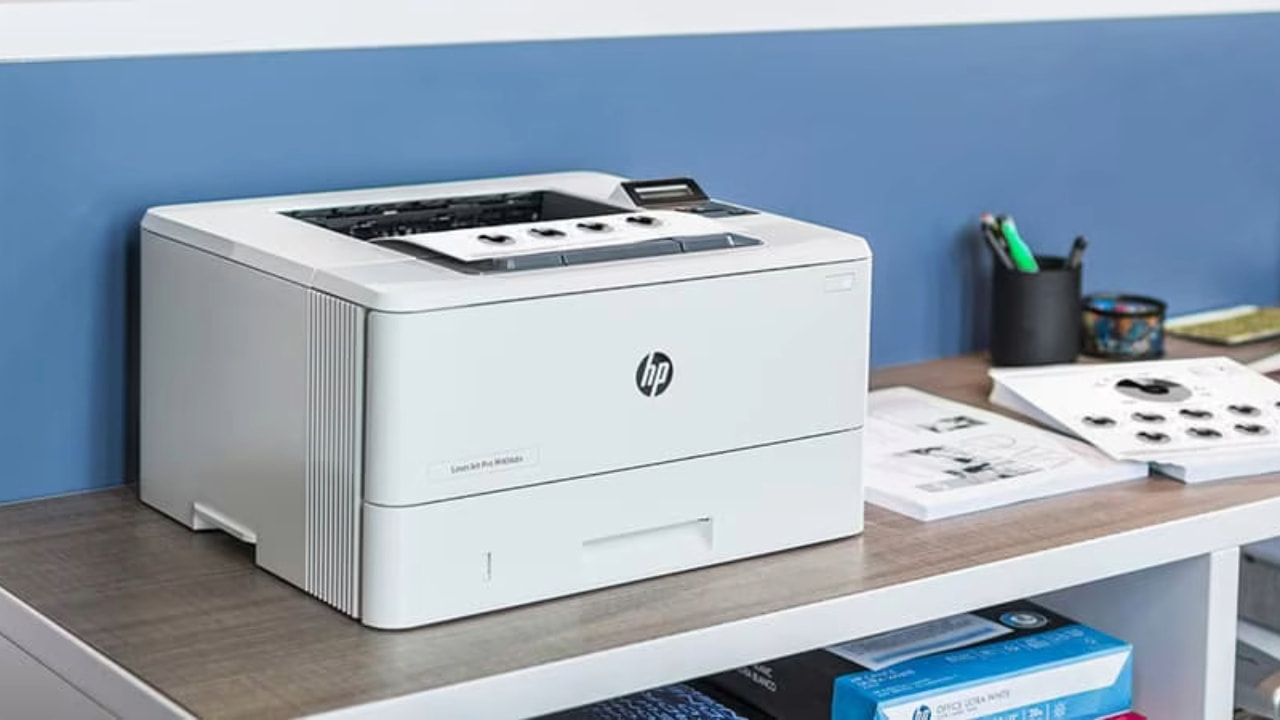 An HP printer kept on a surface.