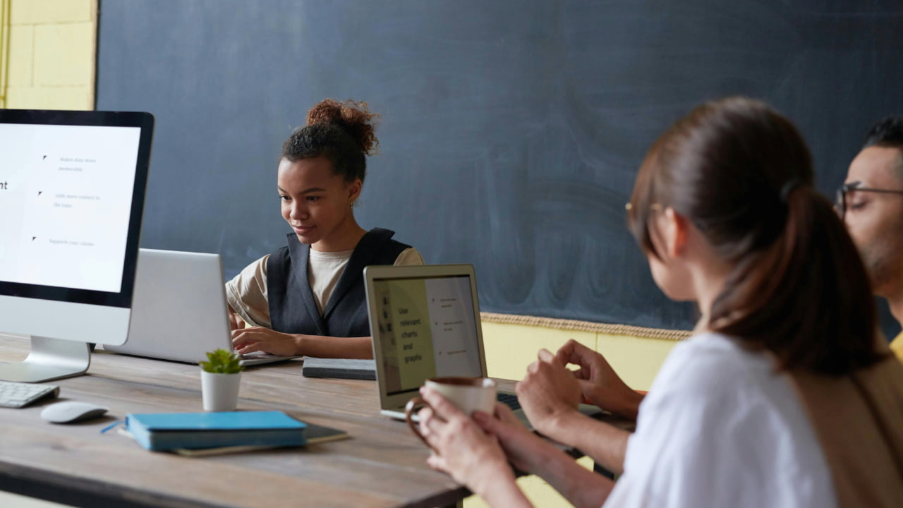 Kids using computer in a classroom