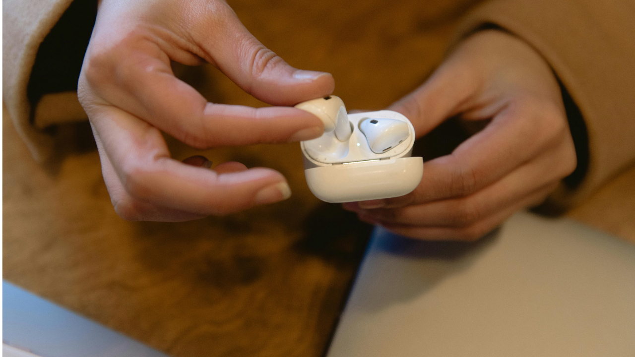 A stock photo showing the Apple AirPods in their case. 