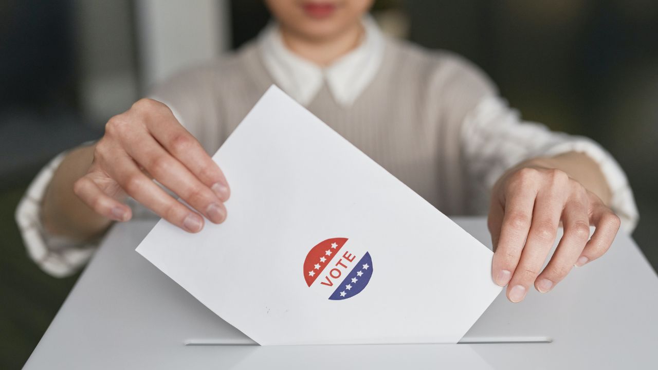 An image of someone voting 