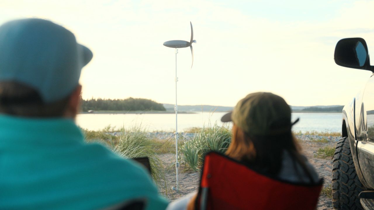 Image of a man using Shine 2.0 wind turbine 