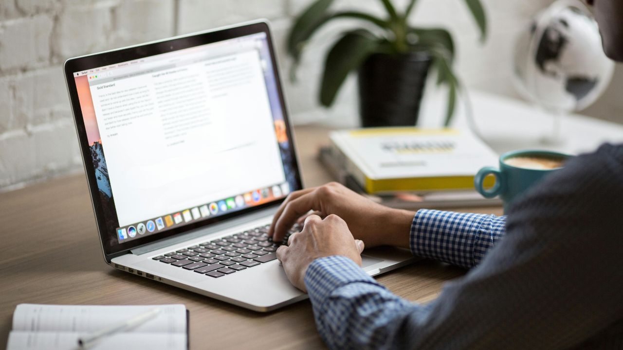 A man accessing his email on his laptop 