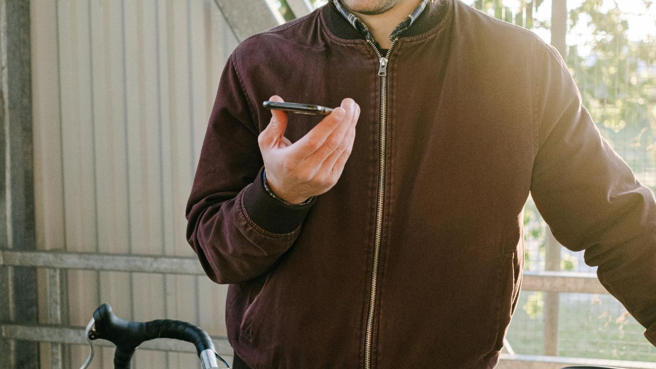 A man recording a phone call on iPhone 