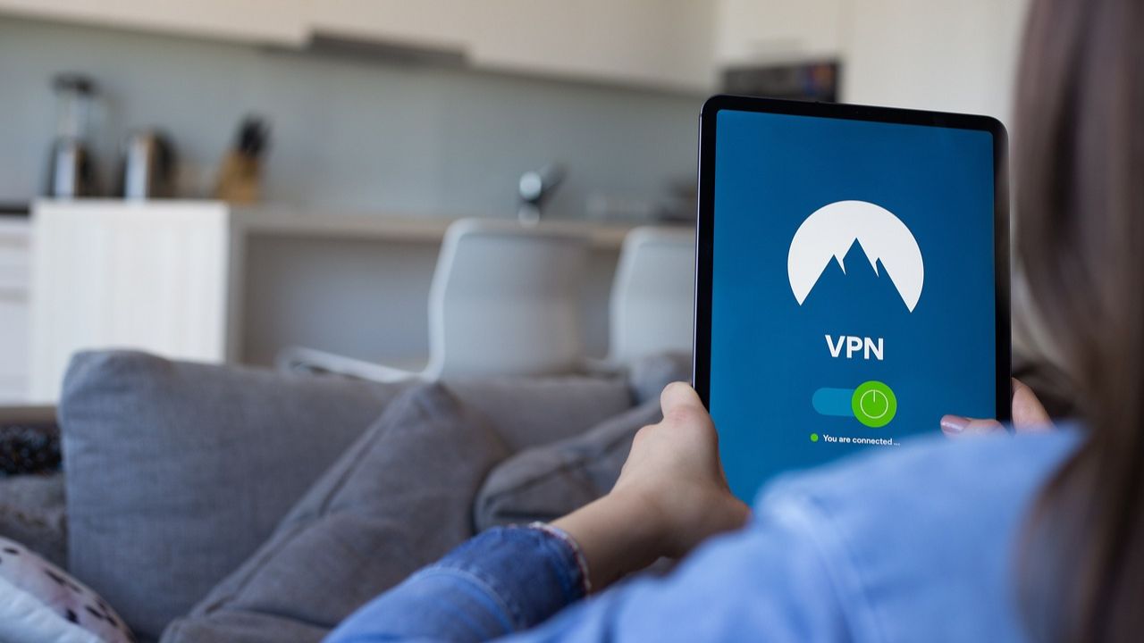 A person using their VPN on tablet 