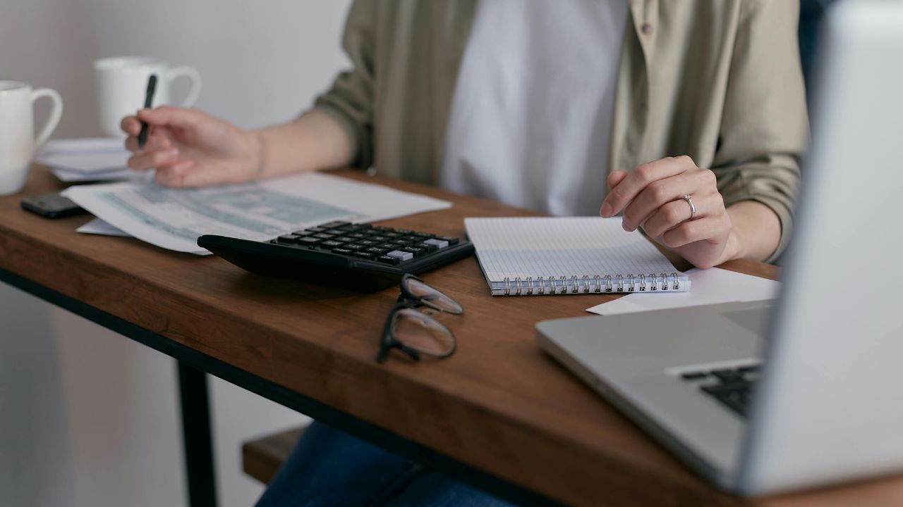 A woman working on her budget 