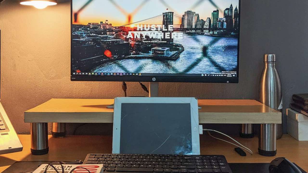An iPad connected to a computer