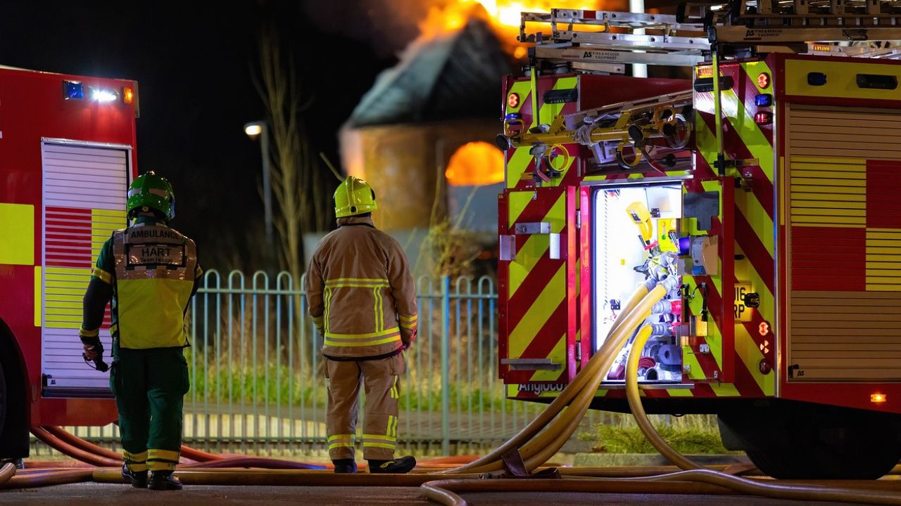 Firefighters putting out a house fire 