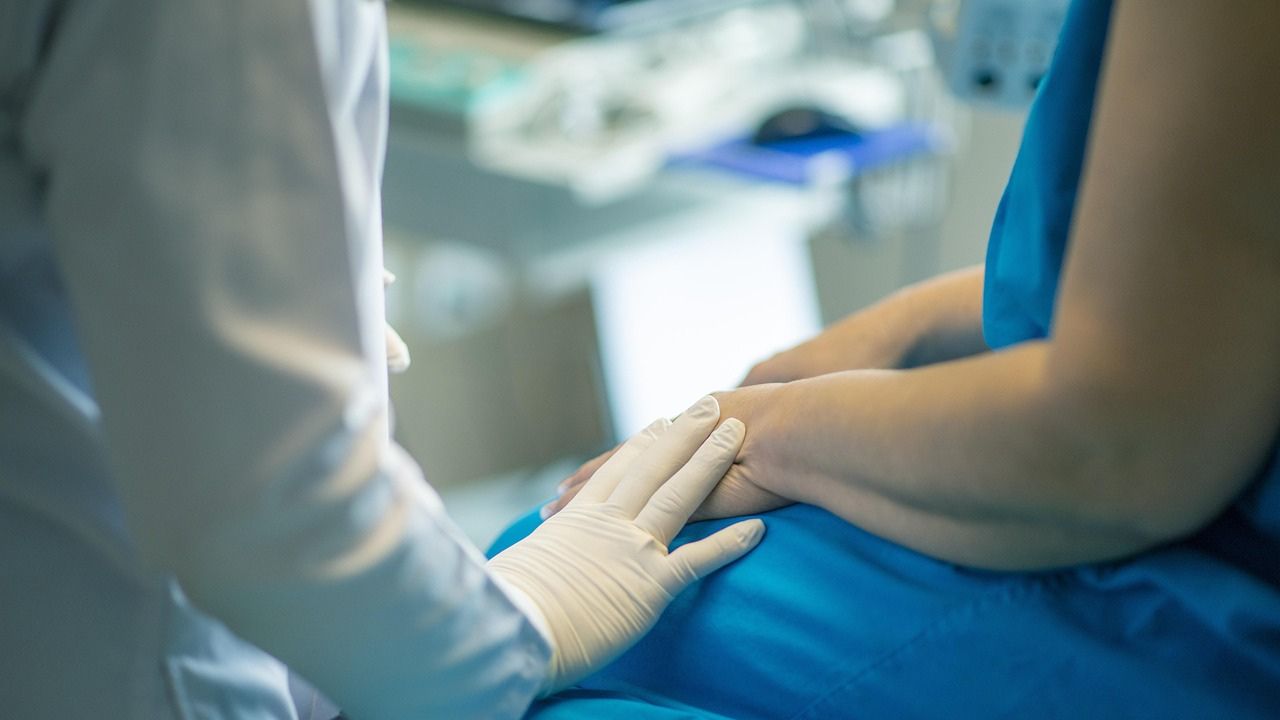 Image of a doctor and patient 