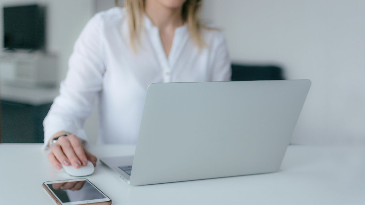 A woman working on her Windows 11 PC 