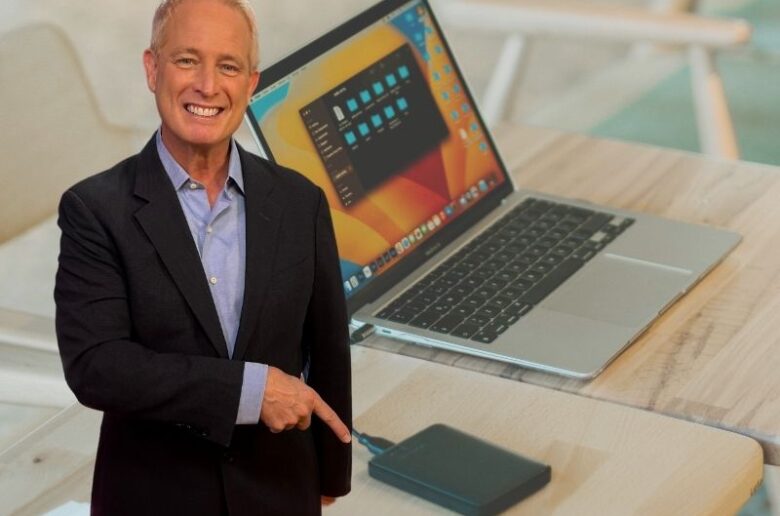 Kurt pointing to external hard drive
