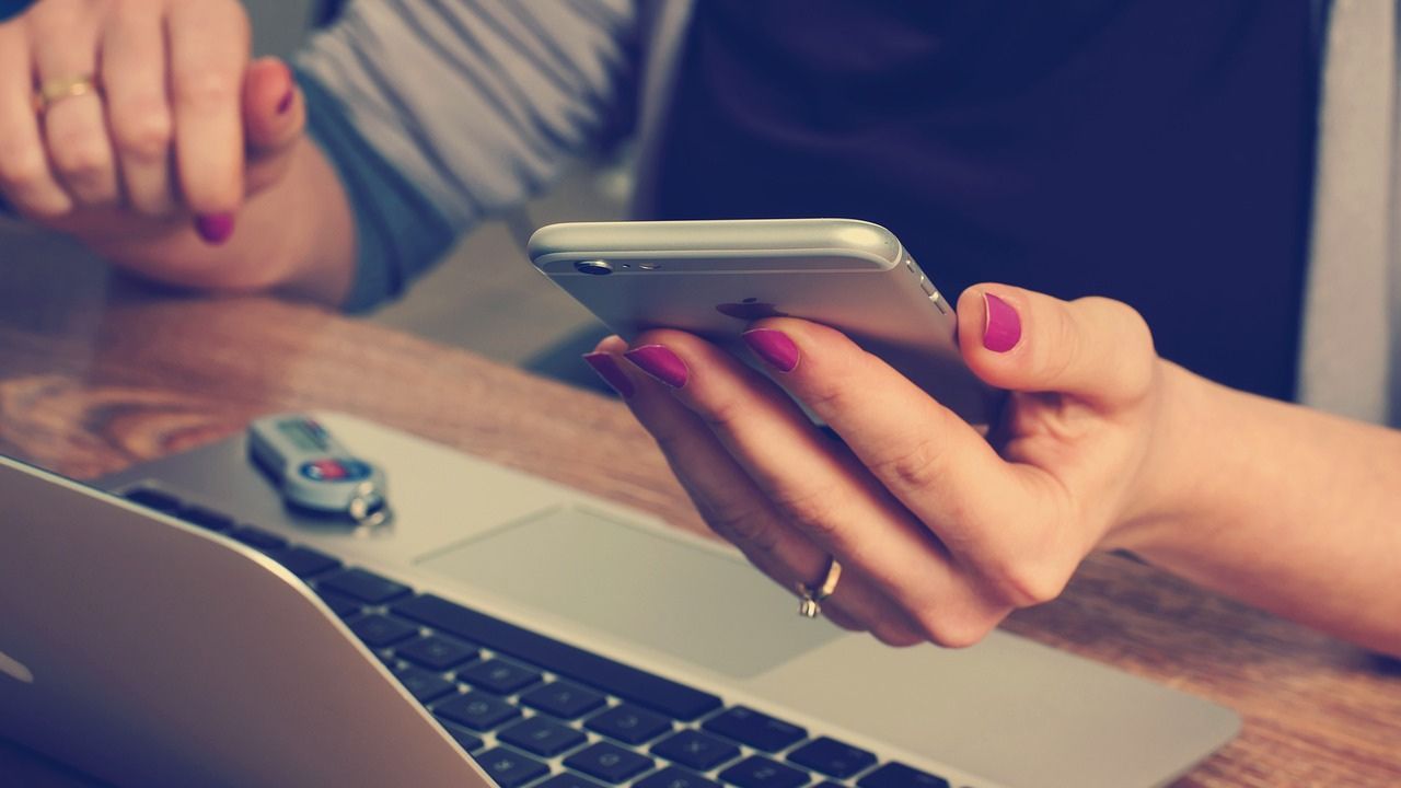 a woman saving a voicemail from a loved one 