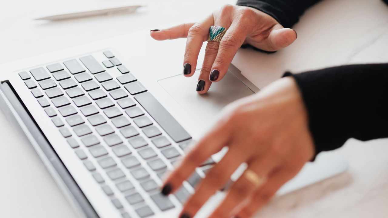 A woman working on her computer
