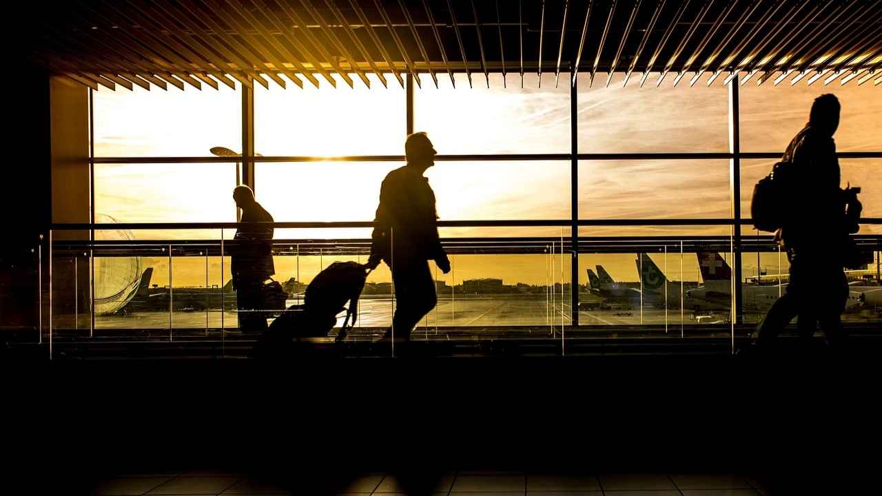 Passengers traveling through an airport 