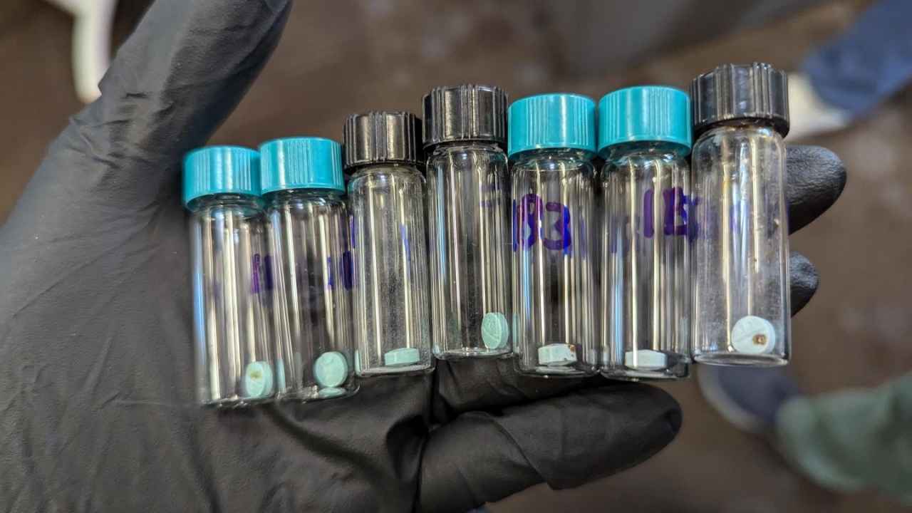 The photo shows fentanyl pills seized at the U.S. border.