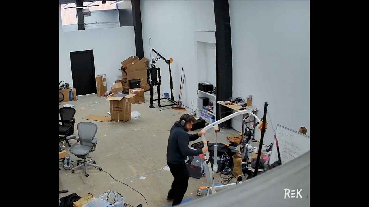 Screenshot from a video showing a Unitree H1 humanoid robot flailing violently during a test