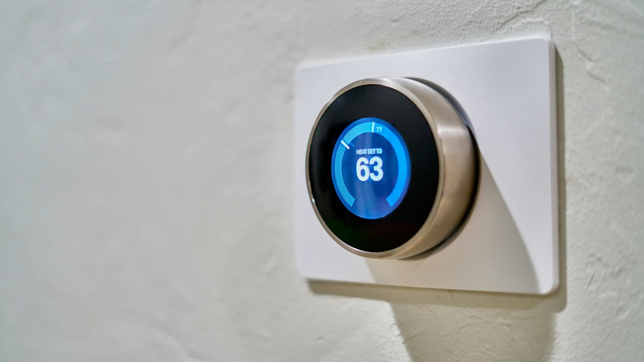 Image showing a thermostat placed on a wall