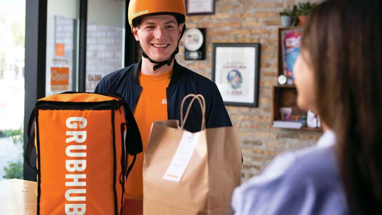 A GrubHub driver picking up an order 