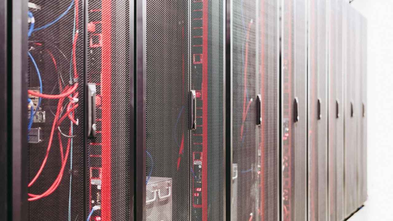 Rows of high-performance servers power the kind of computing needed to model extreme weather and complex data trends.