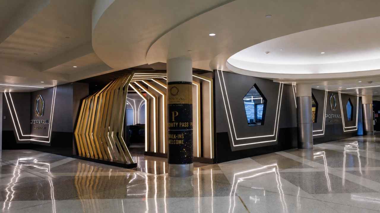 Portal Lounge’s glowing entrance gives travelers at MSP a first look at its high-tech airport lounge concept.