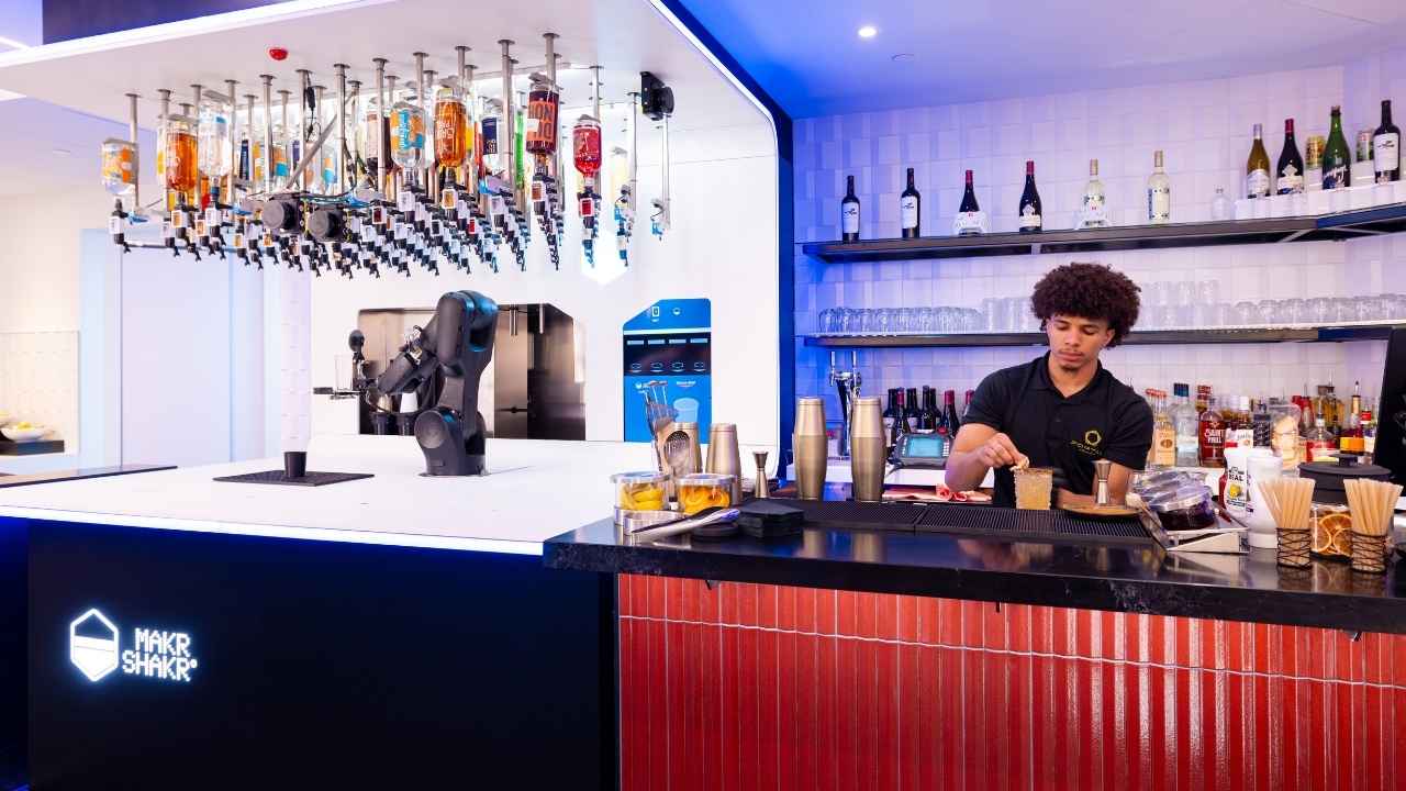 Portal Lounge’s robotic bartender works alongside a traditional bar program to prepare cocktails and mocktails for travelers.