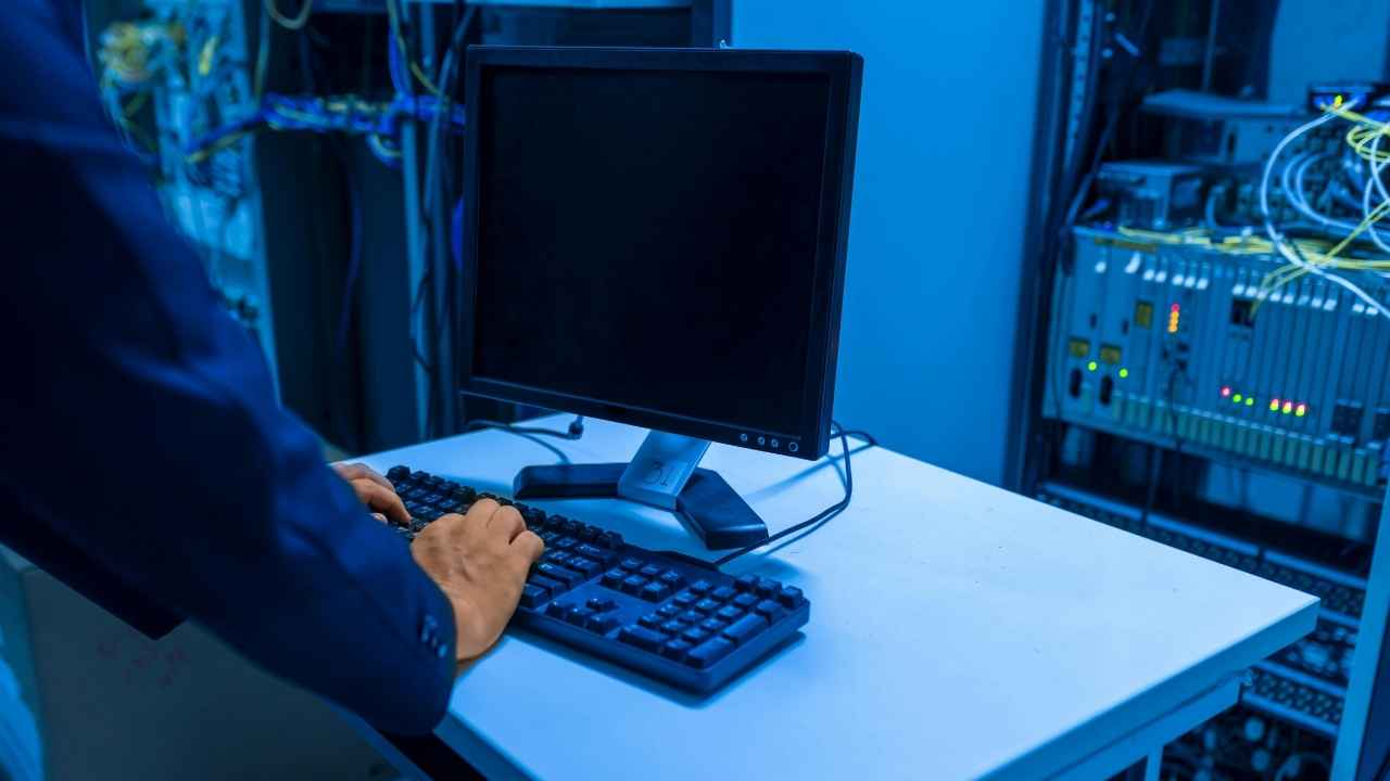 A fake IT support visit can look routine until sensitive files are copied from a company computer.