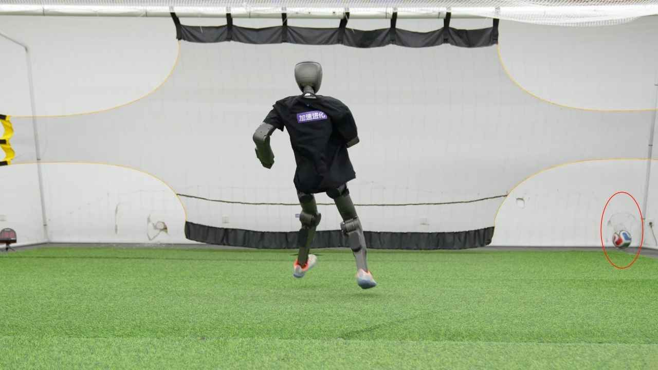 The soccer ball bounces back from the damaged lab wall after Booster Robotics’ T1 delivers a powerful kick.